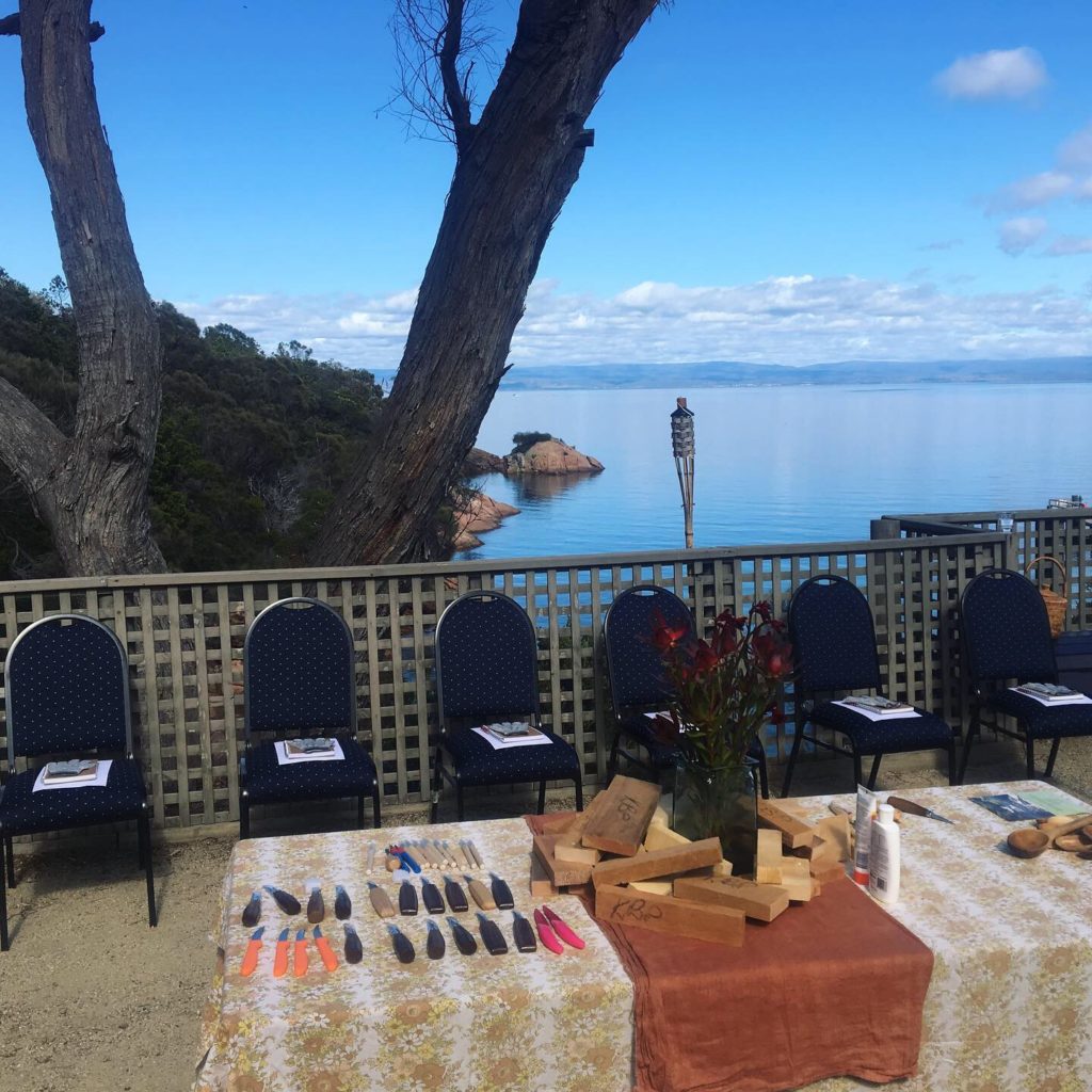 A Forest Folk workshop set up outdoors beside the Tasmanian coast